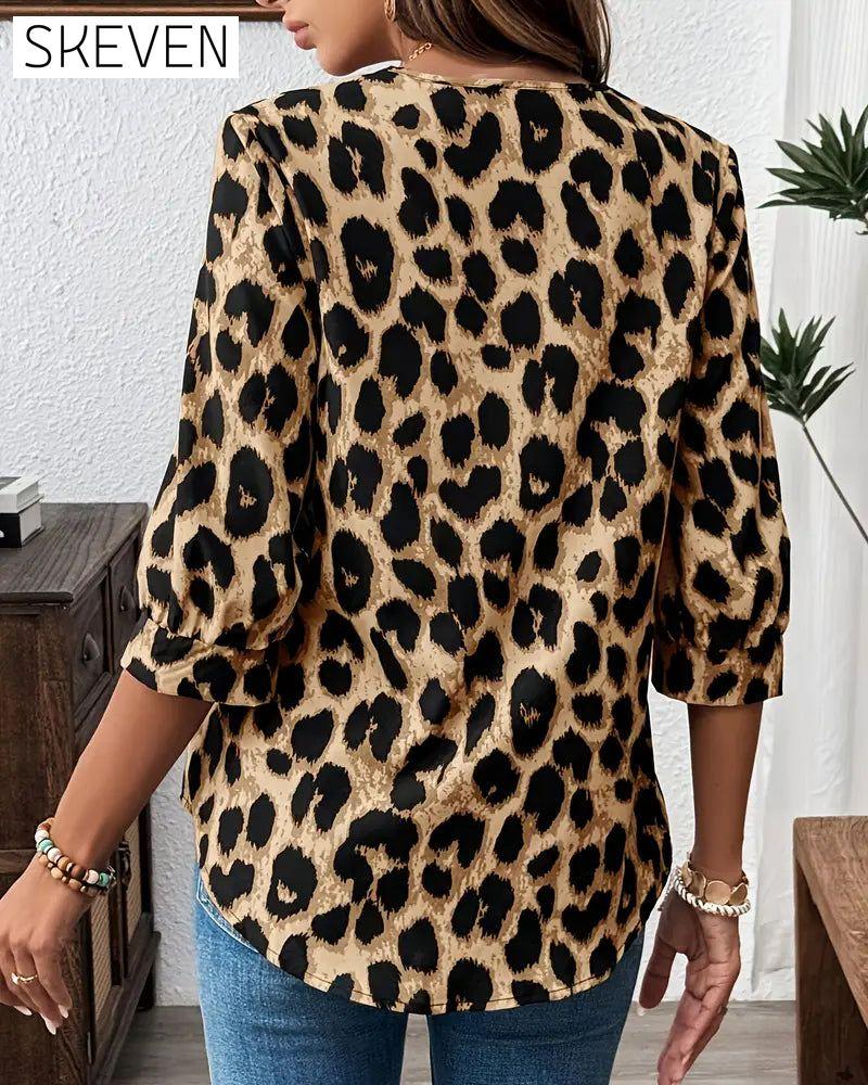 Halbärmelige, lockere Bluse mit Leopardenmuster