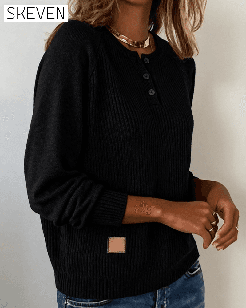 Stilvoller Pullover mit Raglanärmeln und Knopfleiste
