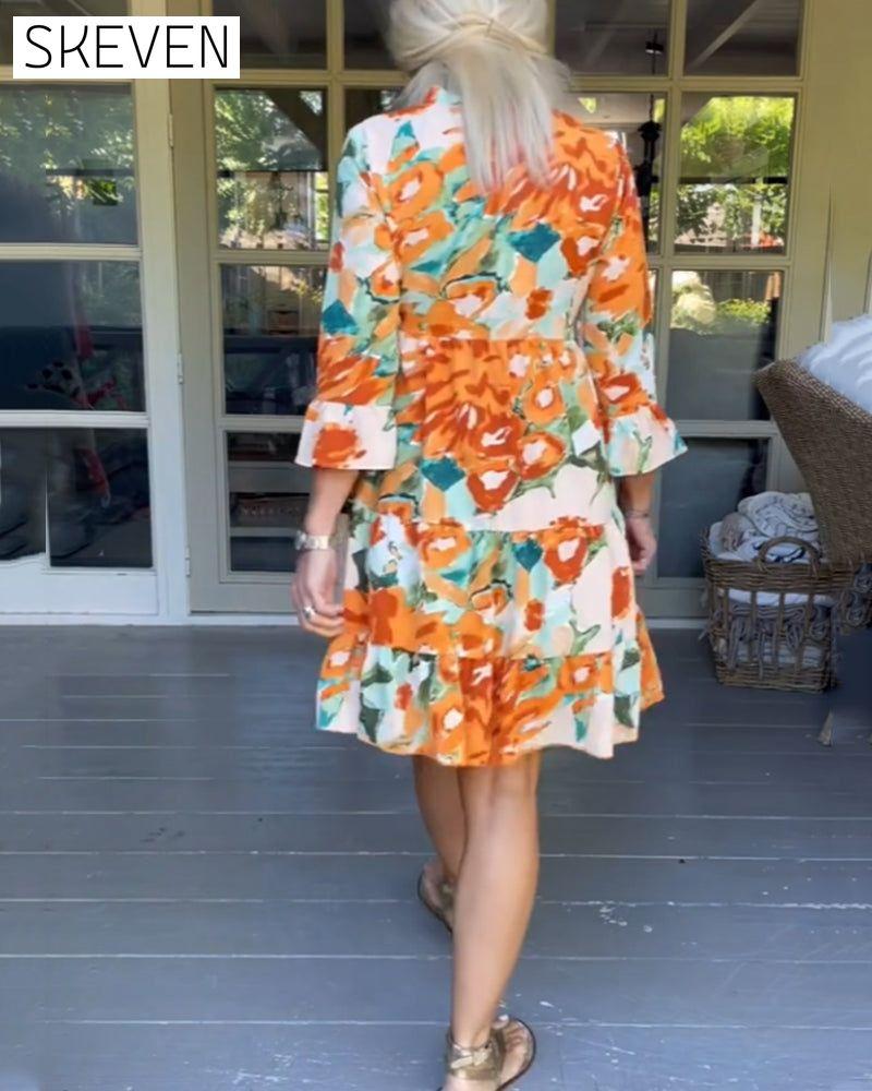 Elegantes Kleid mit V-Ausschnitt und Blumenmuster