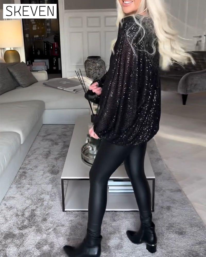 haut à sequins à manches bouffantes et col rond