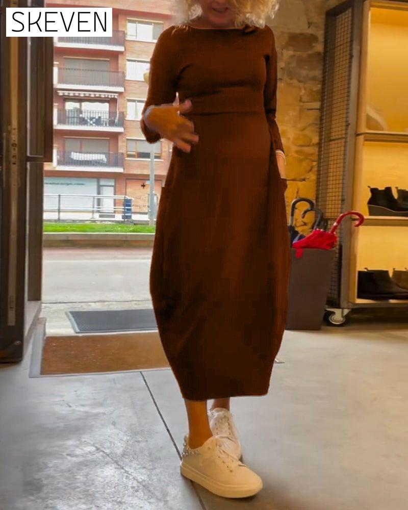 Solid color round neck long sleeve pocket dress
