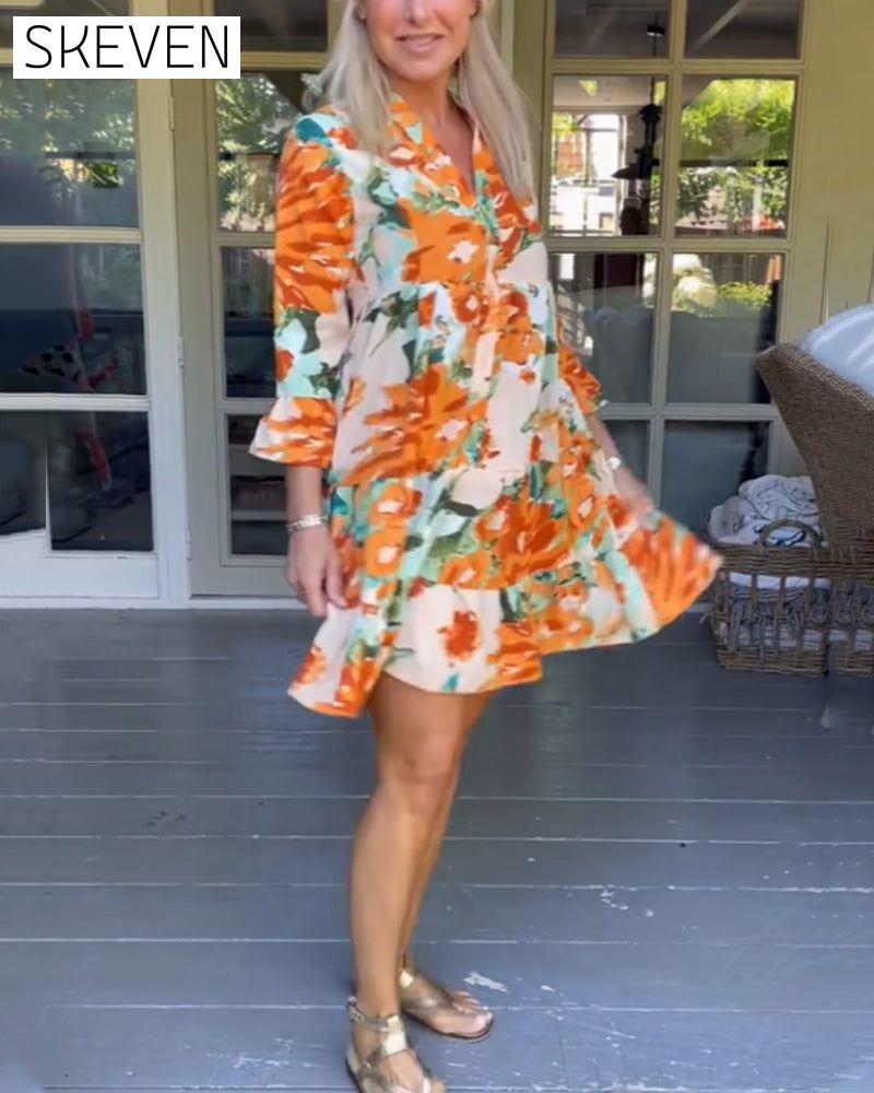 Elegantes Kleid mit V-Ausschnitt und Blumenmuster