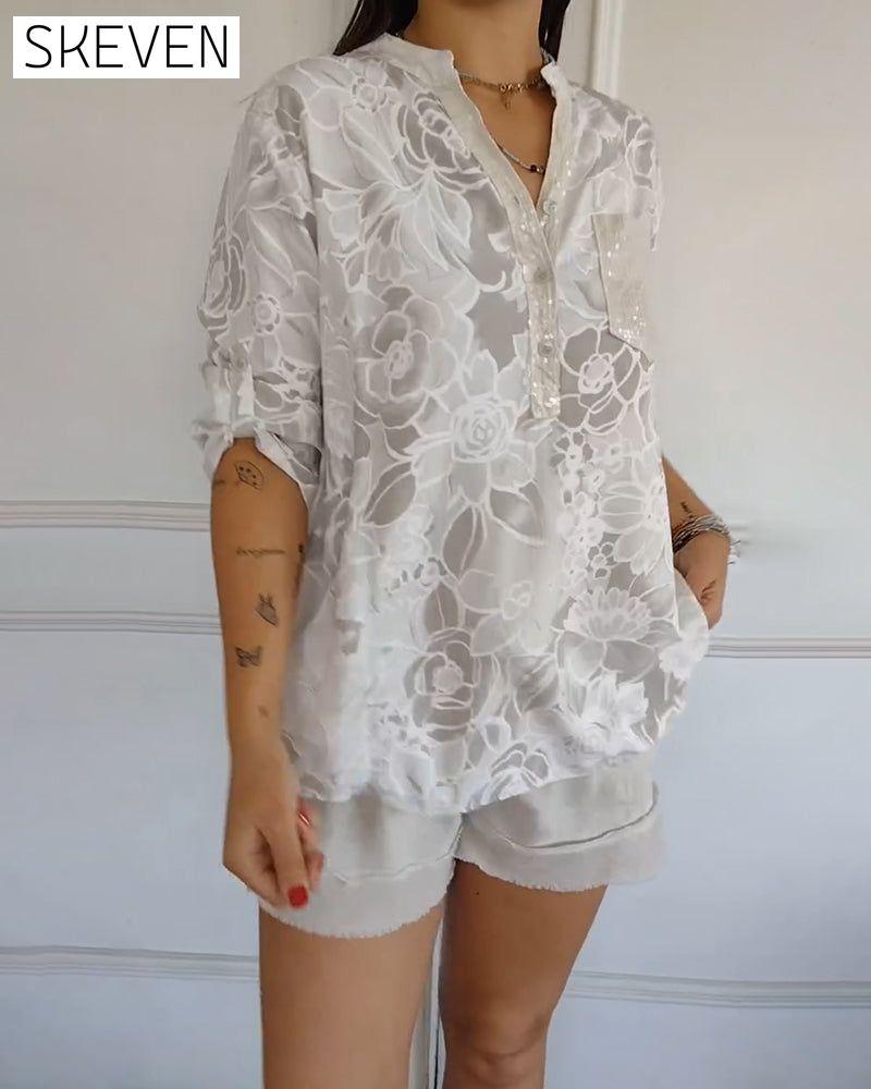 Bedruckte Bluse mit V-Ausschnitt und Knopfleiste