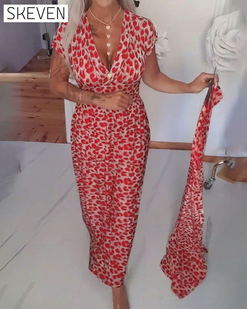 Elegantes Kleid mit Leopardenmuster und V-Ausschnitt