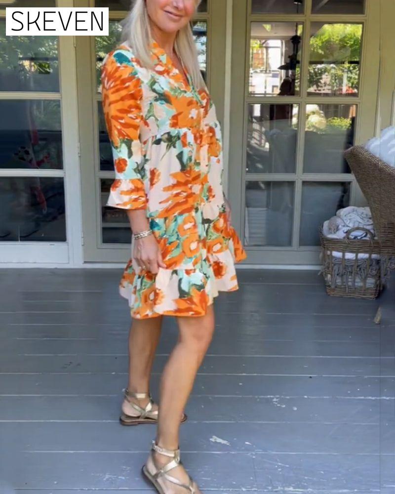 Elegantes Kleid mit V-Ausschnitt und Blumenmuster