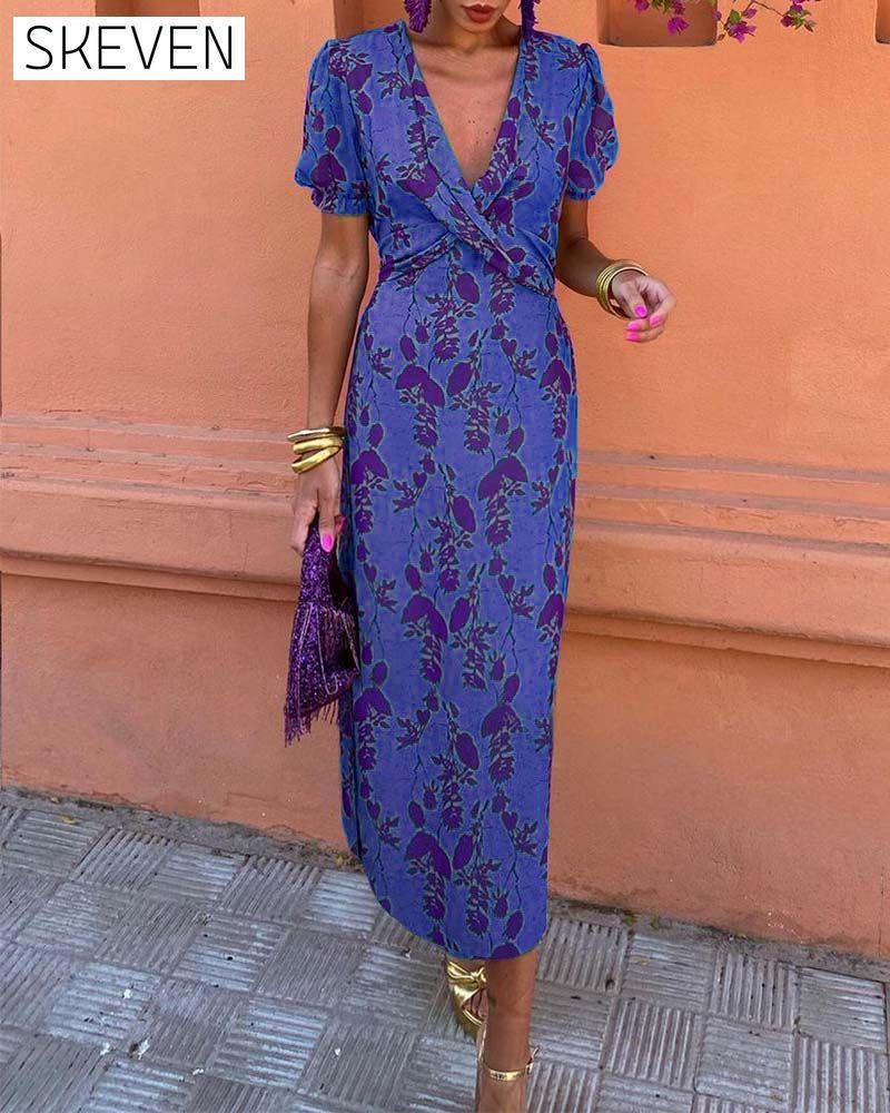 Elegantes A-Linien-Kleid mit Blätterprint, tiefem V-Ausschnitt und Puffärmeln