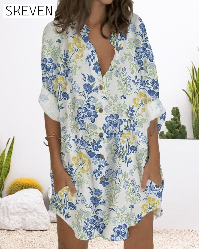 Bedrucktes Kleid mit Knöpfen, langen Ärmeln und Taschen
