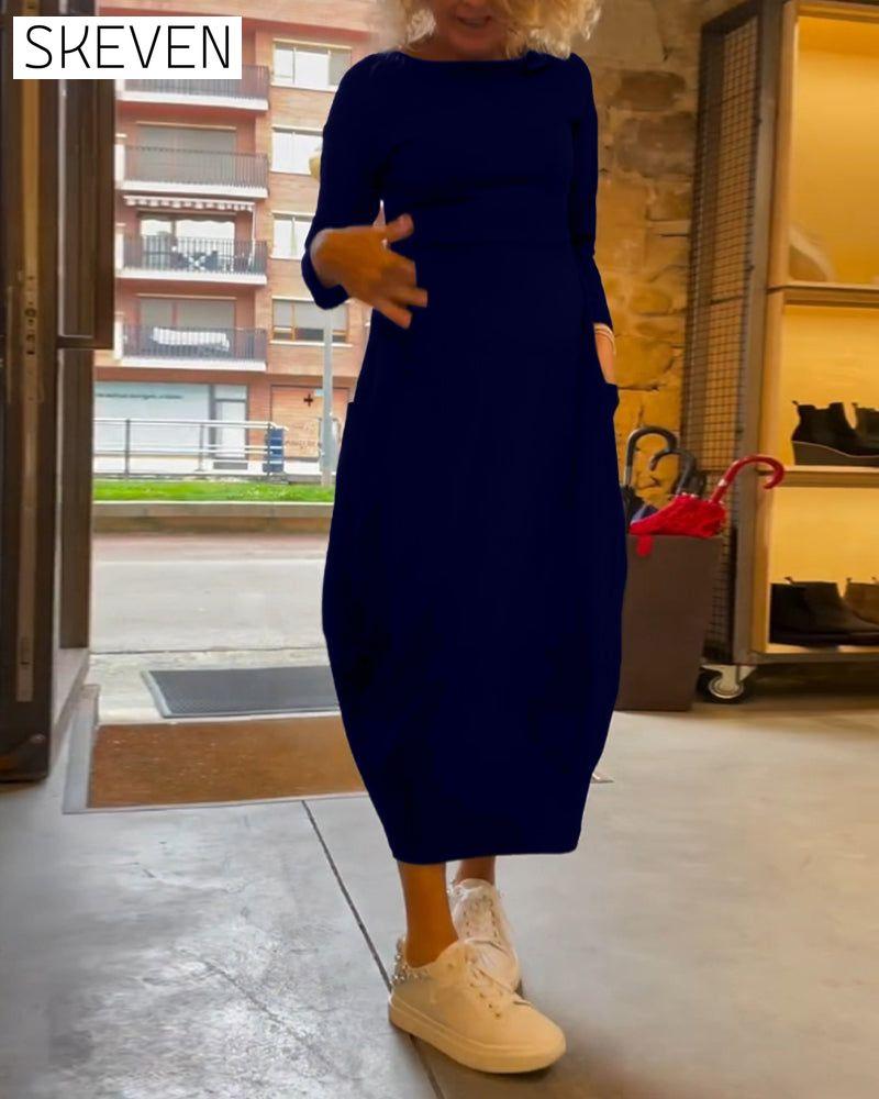 Solid color round neck long sleeve pocket dress