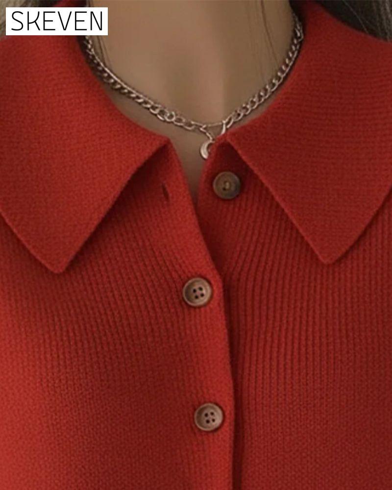 Langärmeliger Pullover mit Knopfleiste und Revers
