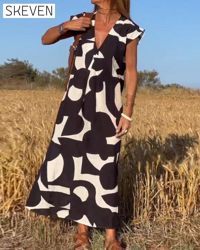 bedrucktes Kleid mit V-Ausschnitt