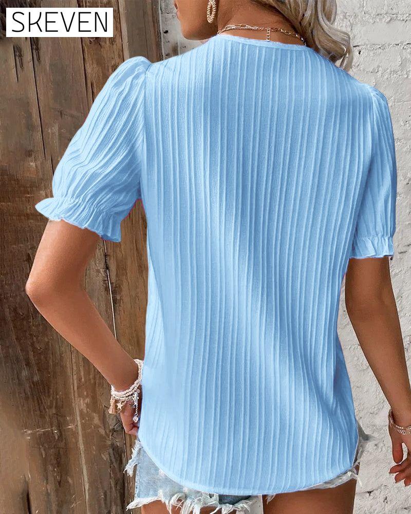 Elegantes Spitzentop mit V-Ausschnitt