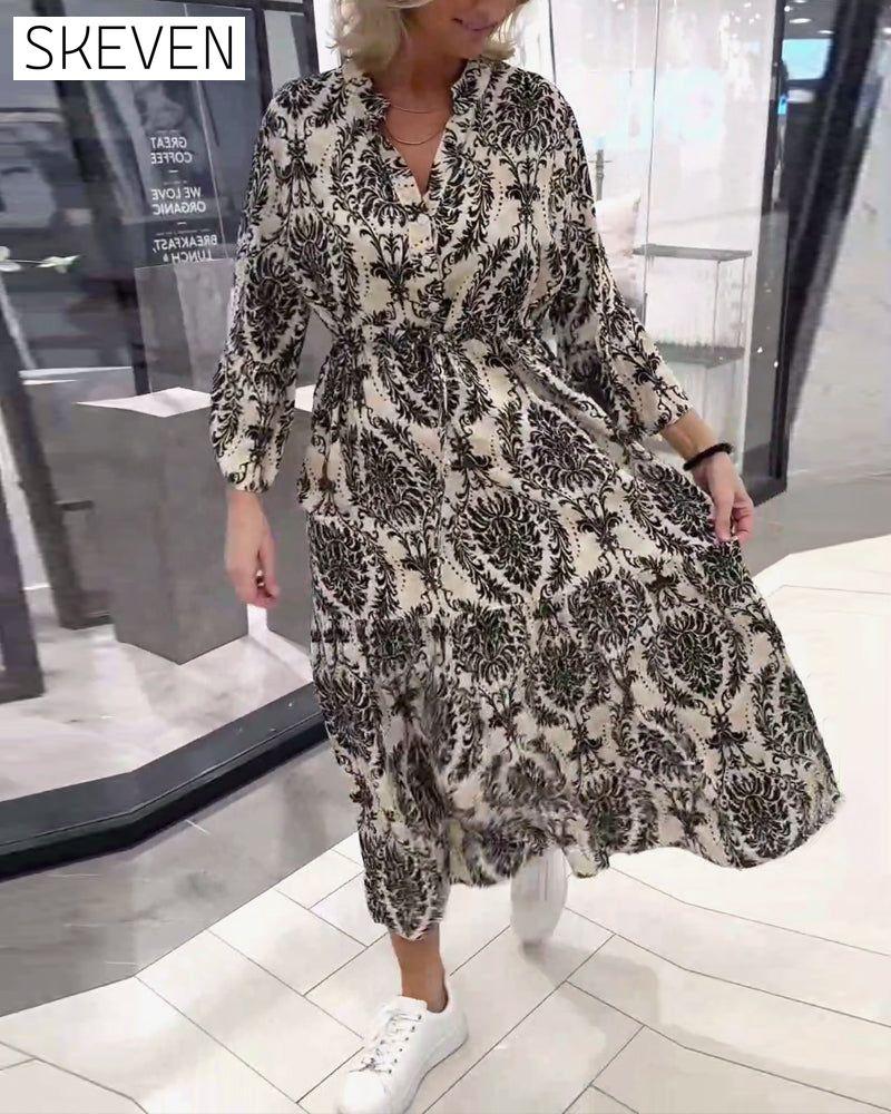 Bedrucktes Kleid mit Glockenärmeln und Kordelzug