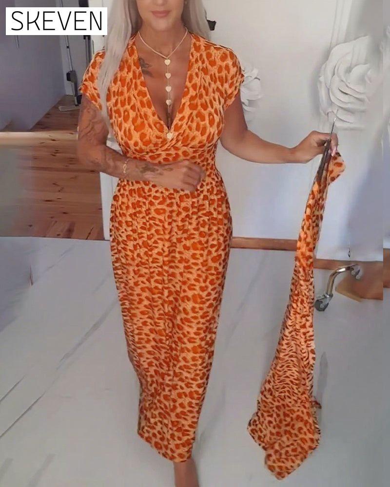Elegantes Kleid mit Leopardenmuster und V-Ausschnitt
