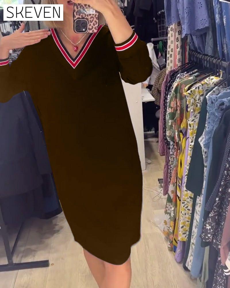 Robe élégante à col en V avec poches