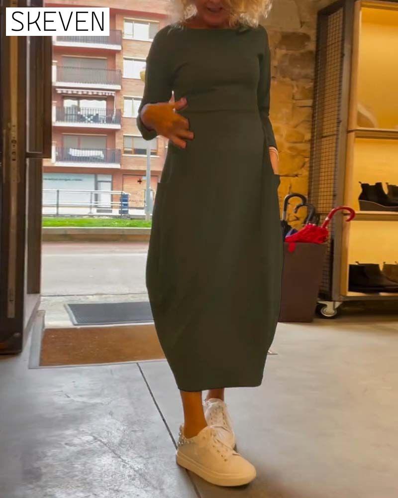 Solid color round neck long sleeve pocket dress