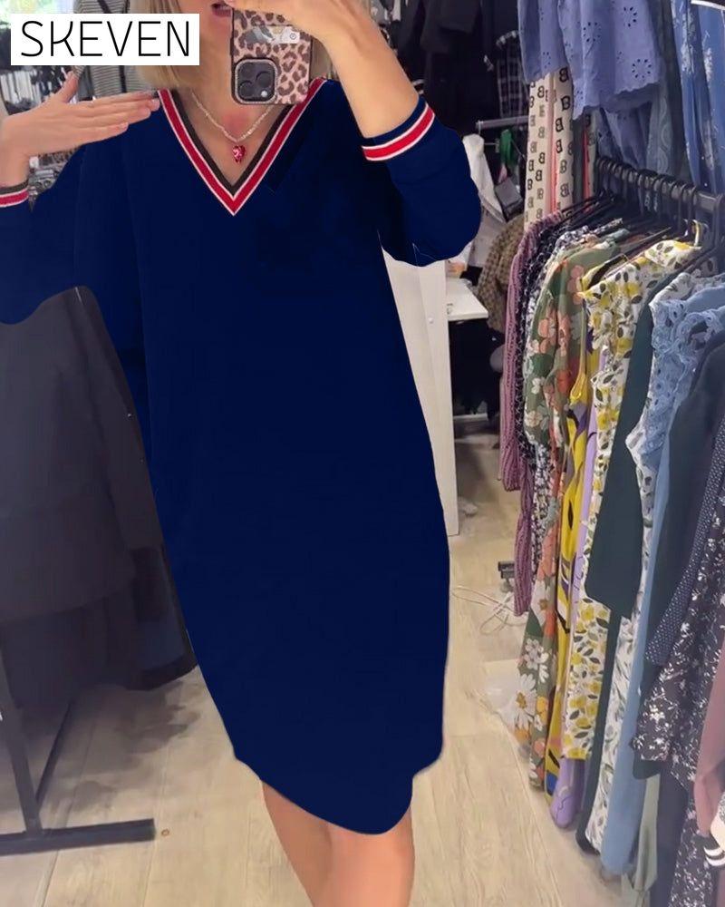 Robe élégante à col en V avec poches