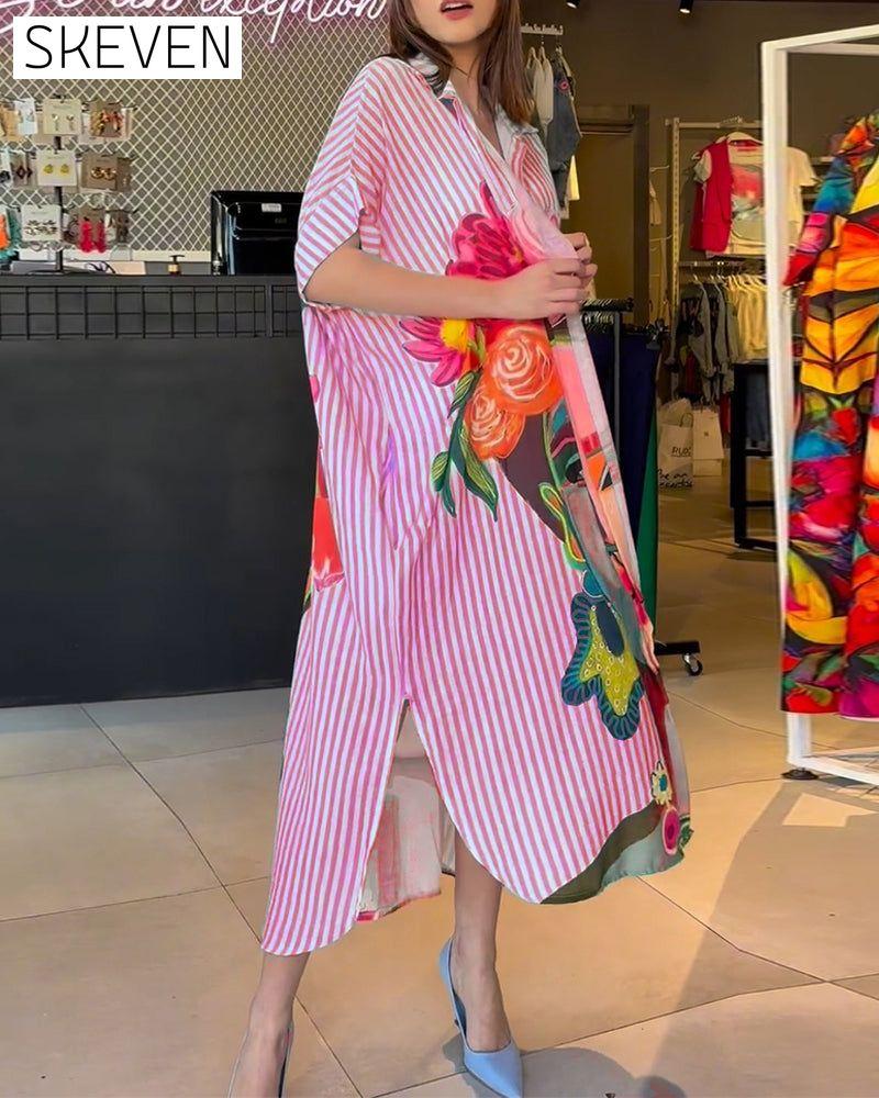 Bluse mit vertikalen Streifen und Charakterprint, Reversschlitz