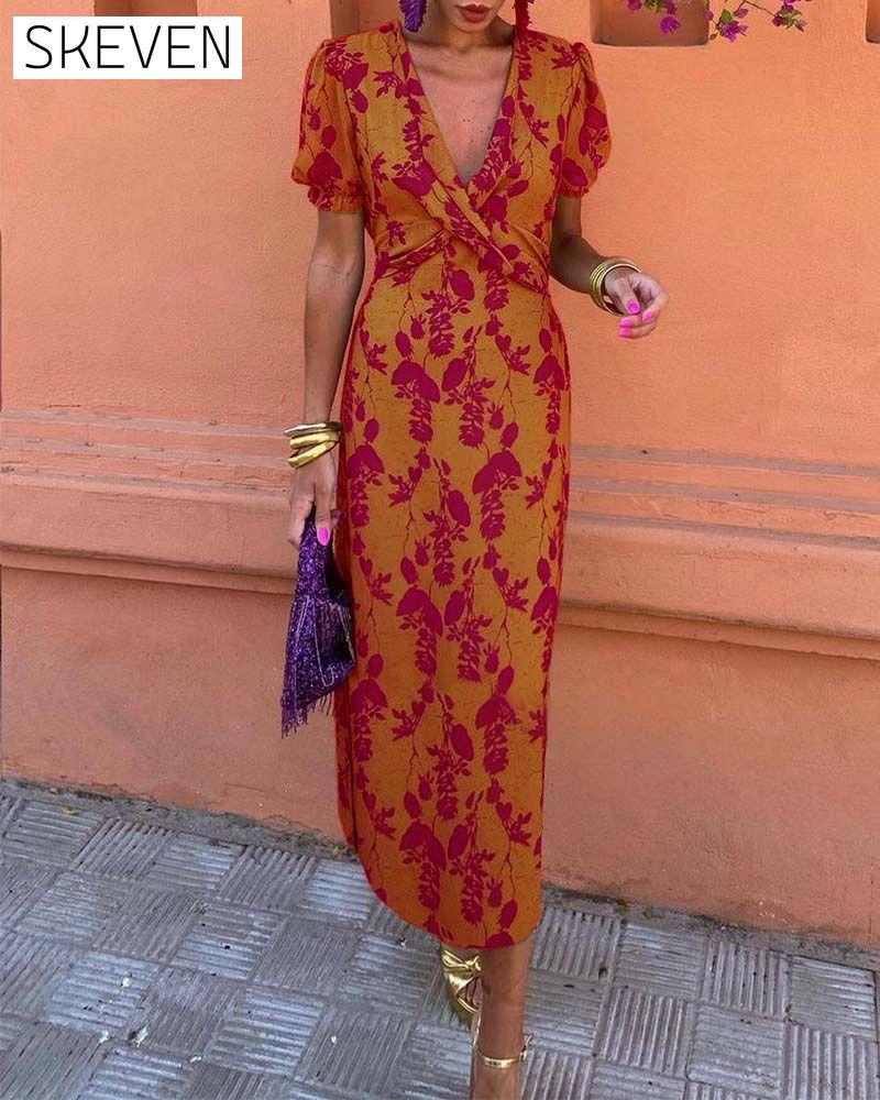 Elegantes A-Linien-Kleid mit Blätterprint, tiefem V-Ausschnitt und Puffärmeln