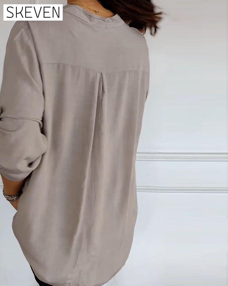 Paneled sequin button casual top