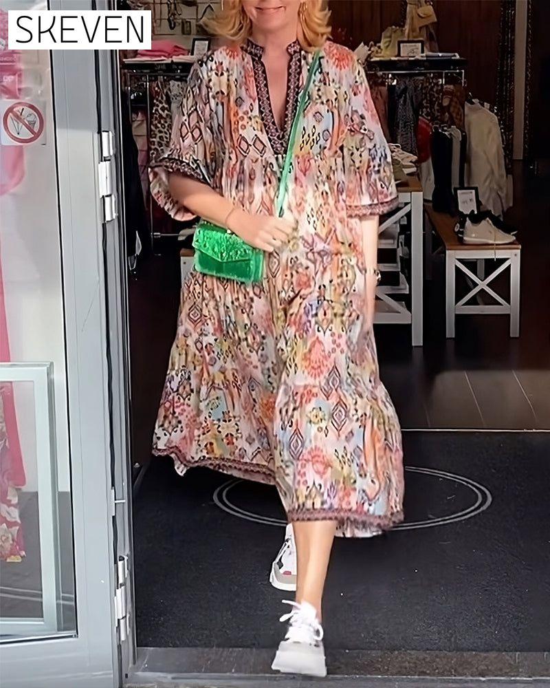 Elegantes, bedrucktes langes Kleid mit V-Ausschnitt