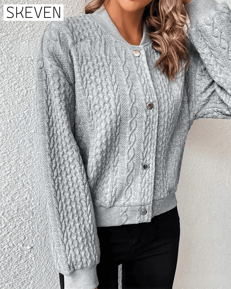 Einfarbige Strickjacke mit Knopfleiste