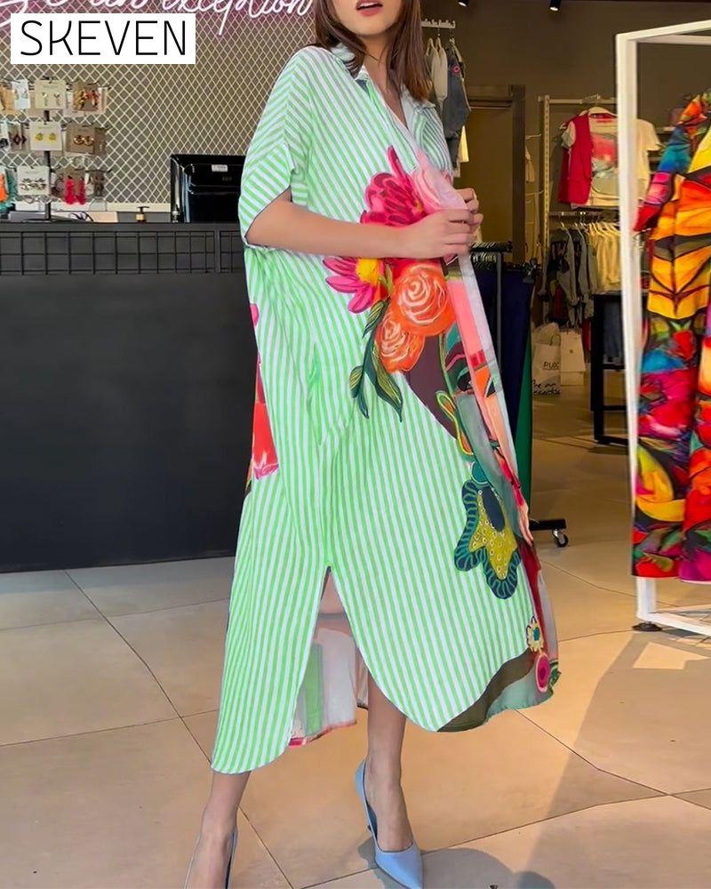 Bluse mit vertikalen Streifen und Charakterprint, Reversschlitz