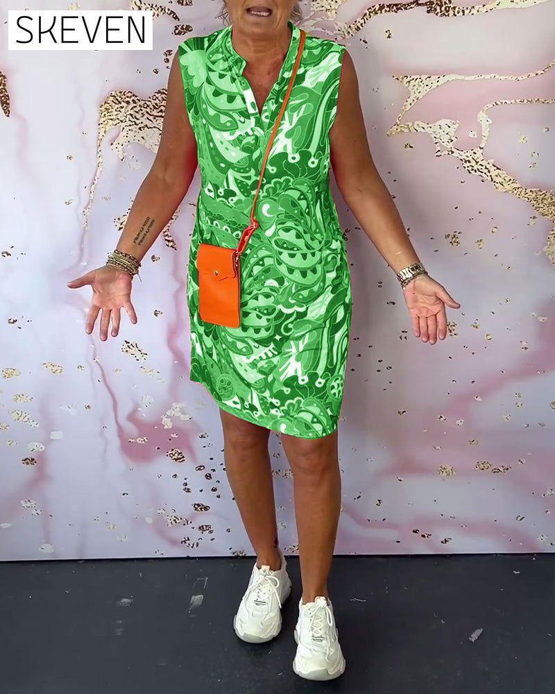 Elegantes, ärmelloses Kleid mit Print und V-Ausschnitt