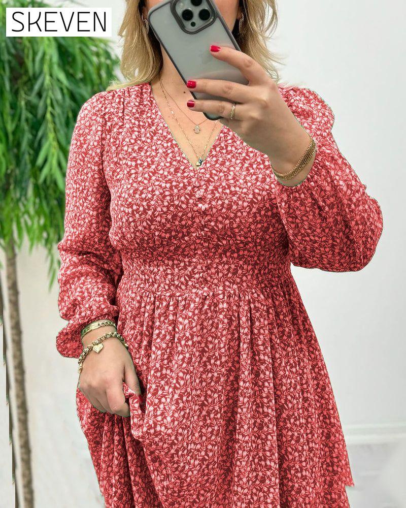 Elegantes Kleid mit Print und Knöpfen