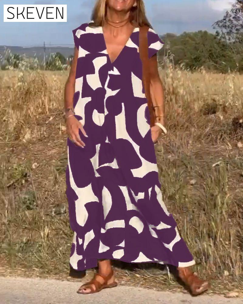 bedrucktes Kleid mit V-Ausschnitt