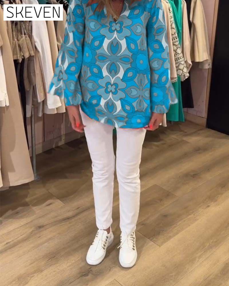 Lockere und vielseitige bedruckte Bluse