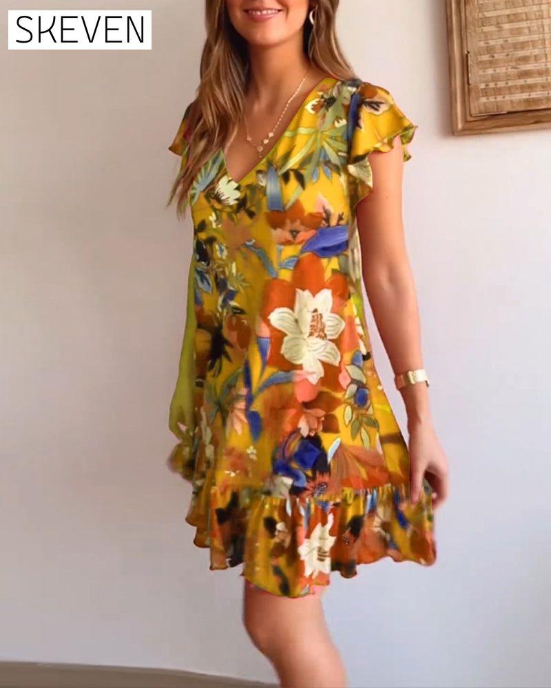 robe fleurie à col en V et à volants