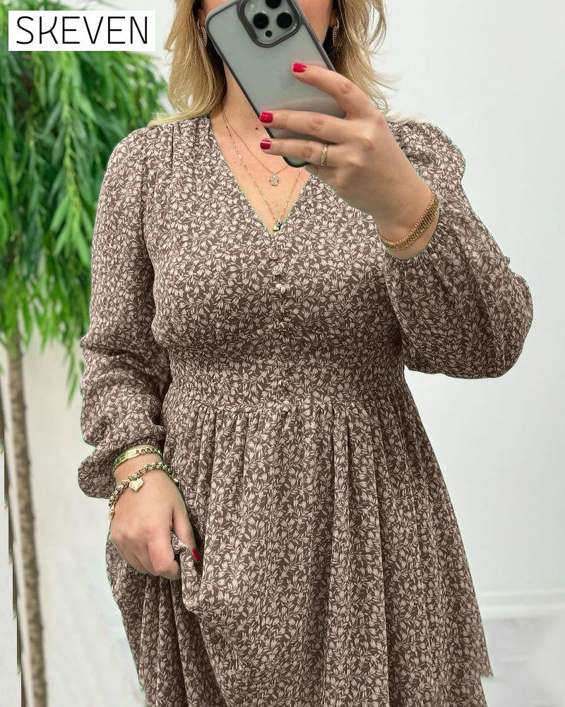 Elegantes Kleid mit Print und Knöpfen