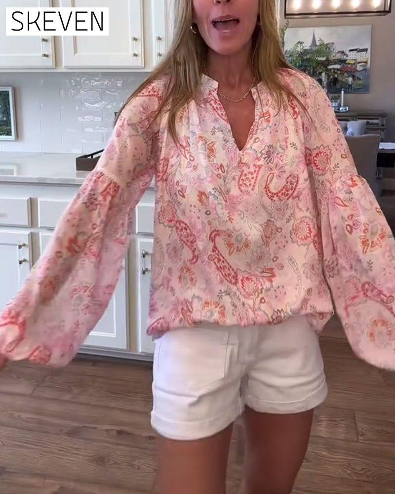 Blouse fleurie à manches ballon