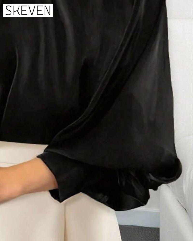 Bluse mit Laternenärmeln und hohem Kragen