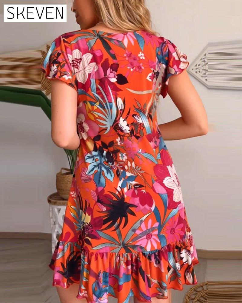 robe fleurie à col en V et à volants
