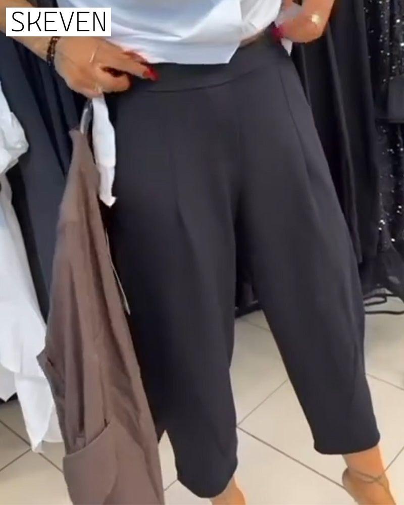 Pantalon harem uni élégant