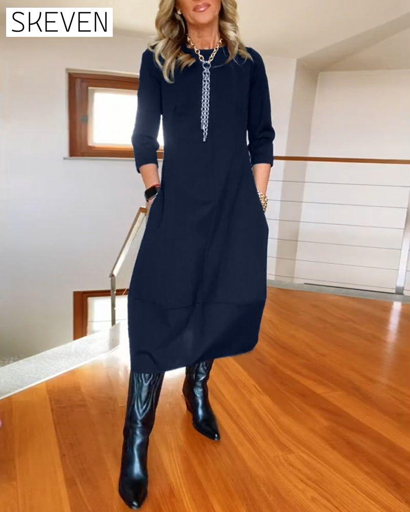 Elegantes, einfarbiges Kleid mit Rundhalsausschnitt und Taschen