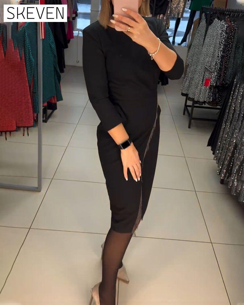 Robe à col rond et fente oblique