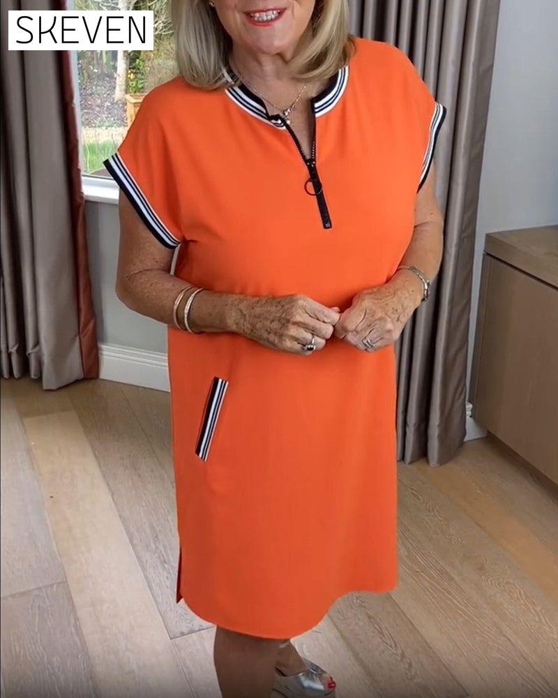 Sportkleid mit halbem Reißverschluss und Kontrastfarbe