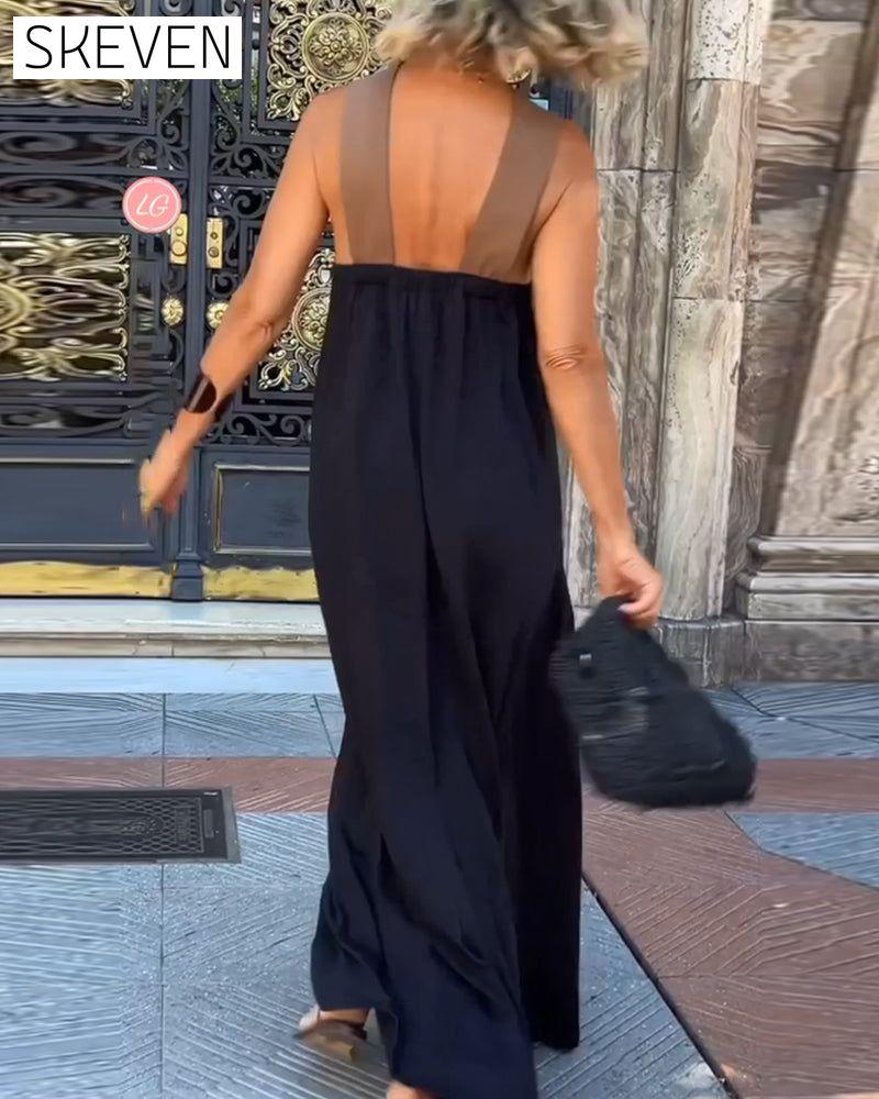 Elegantes Kleid mit gekreuztem Rückenausschnitt und Kontrastfarbe
