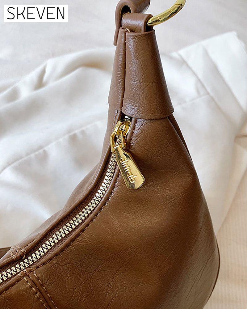 Achseltasche aus gewachstem Leder 