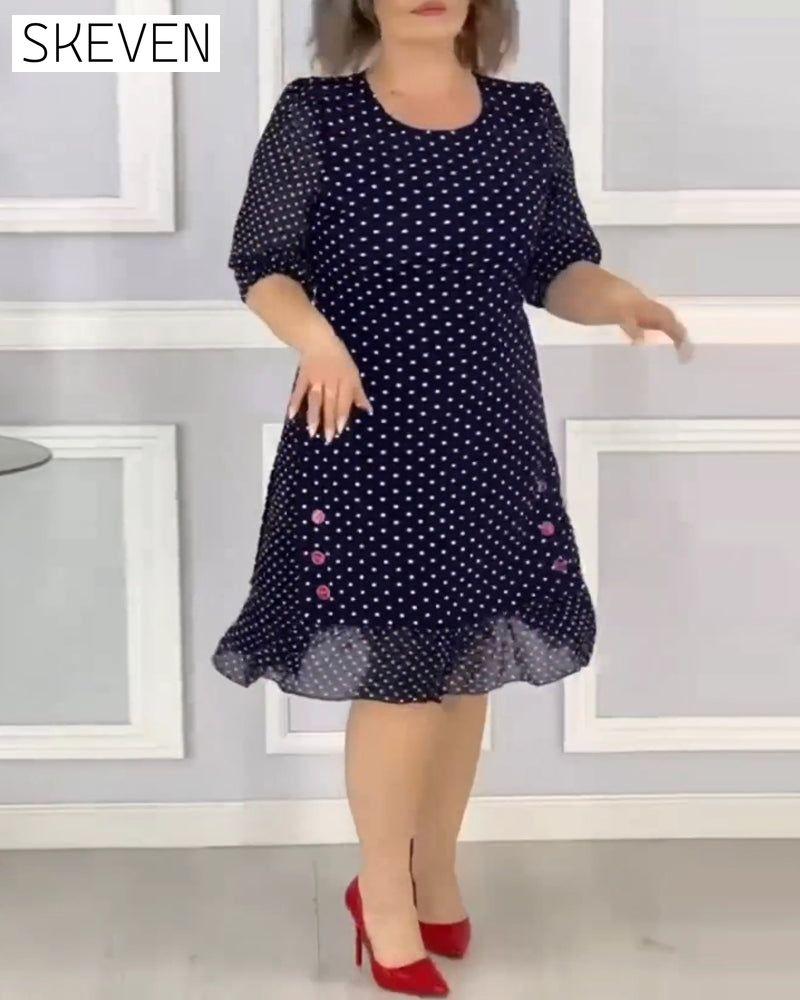 Robe élégante à manches courtes et imprimé à pois
