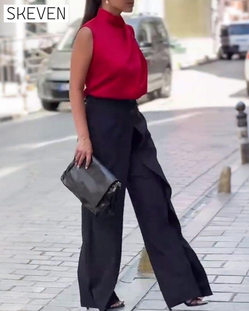 Pantalon asymétrique à jambes larges et superposées