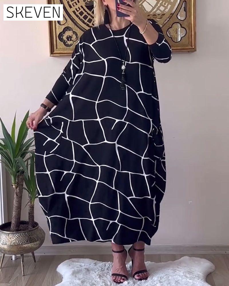 Robe ample à manches longues et col rond avec poches