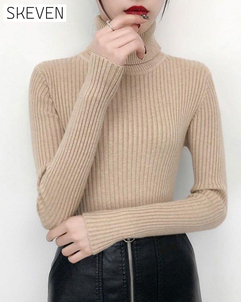 Hochgeschlossener Strickpullover als Basisschicht