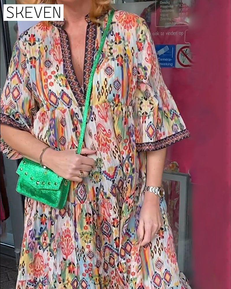 Elegantes, bedrucktes langes Kleid mit V-Ausschnitt