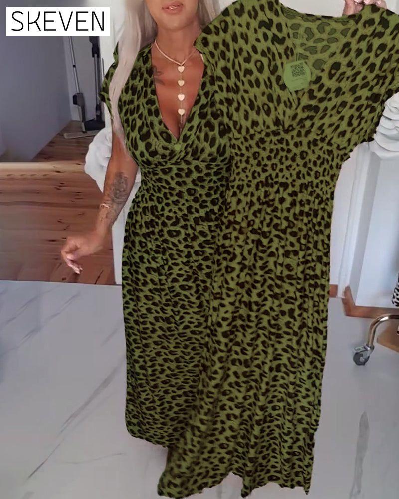 Elegantes Kleid mit Leopardenmuster und V-Ausschnitt