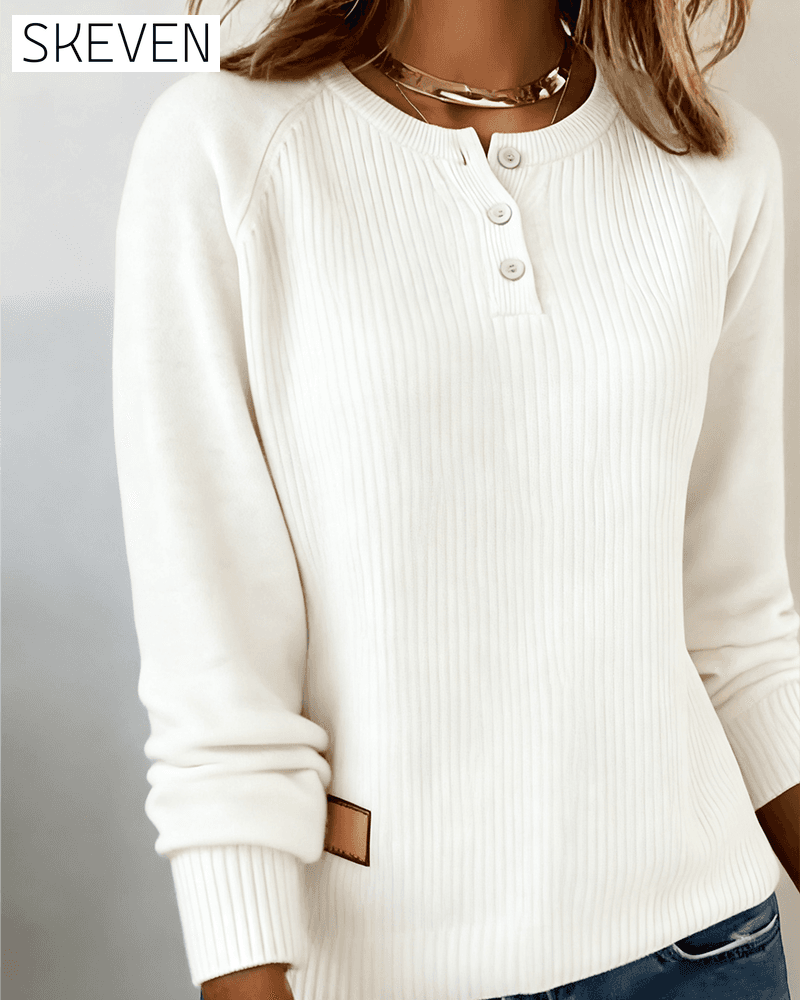 Stilvoller Pullover mit Raglanärmeln und Knopfleiste