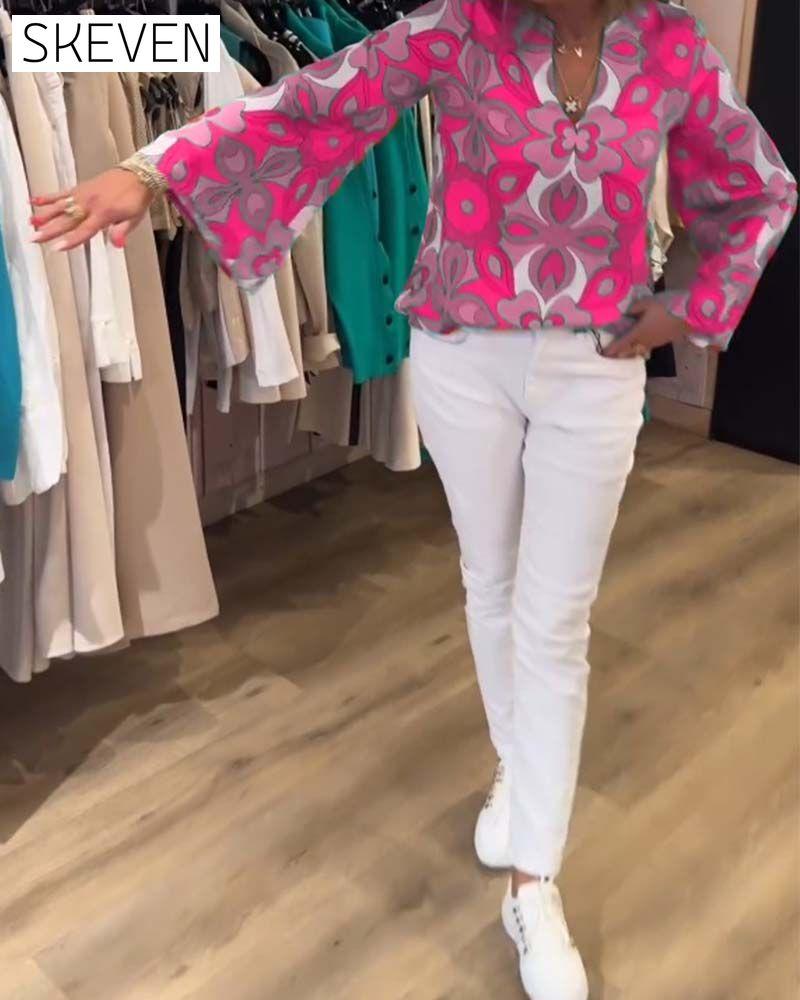 Lockere und vielseitige bedruckte Bluse