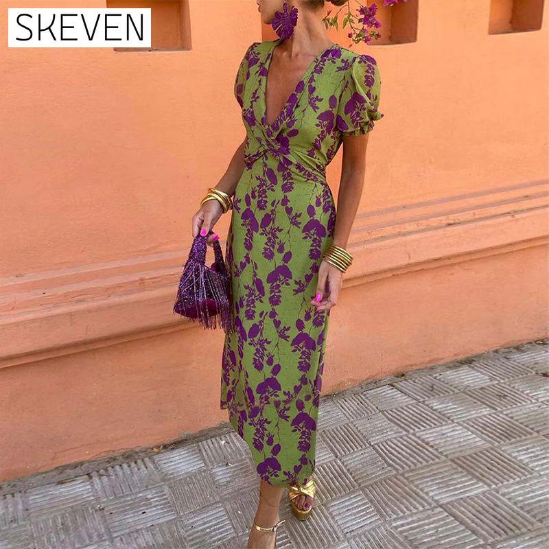 Elegantes A-Linien-Kleid mit Blätterprint, tiefem V-Ausschnitt und Puffärmeln